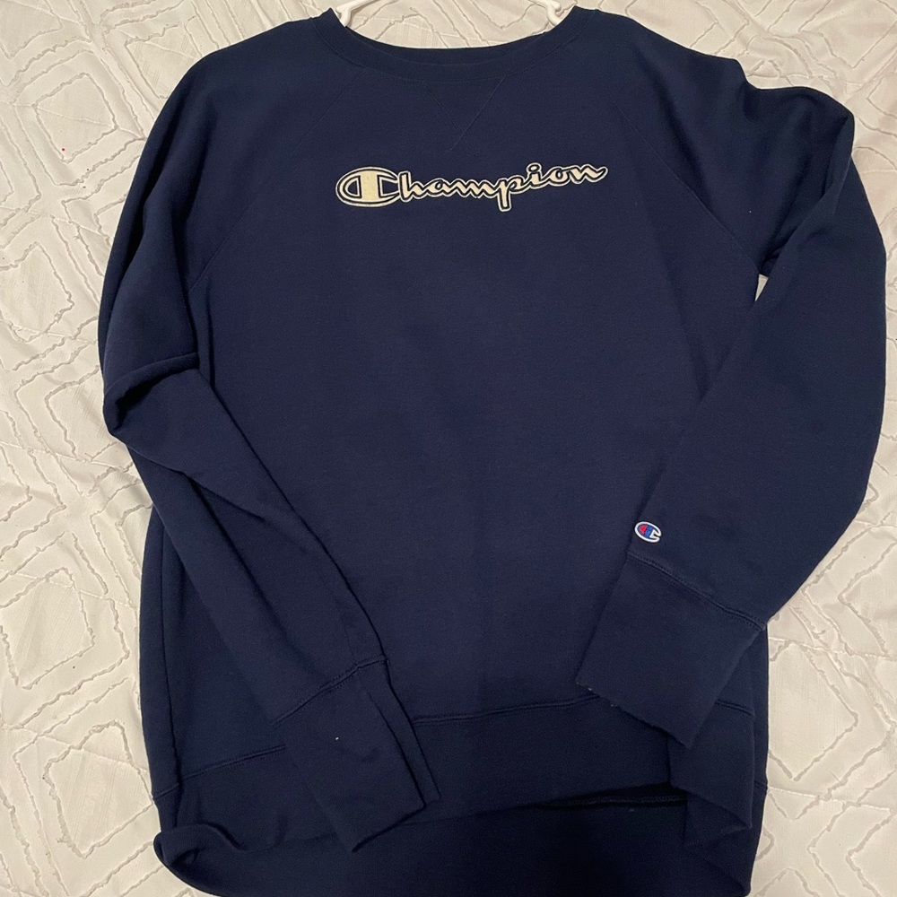 Champion Sweatshirt, wore a few times nothing wrong with it! Color is Navy.